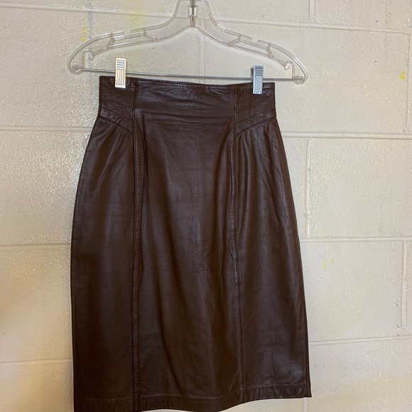 Coffee brown leather skirt very nice stitching around the waist , zip up back. - Picture 2 of 2